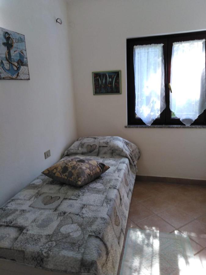Villa Panoramica Immersa Nel Verde Porto Pino Exterior foto