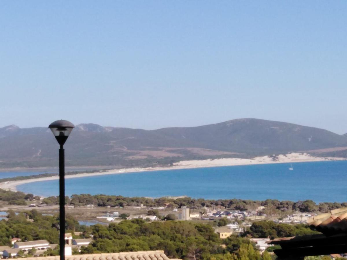 Villa Panoramica Immersa Nel Verde Porto Pino Exterior foto